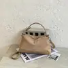 Bolso de mano francés de nicho texturizado elegante para mujer otoño comercio exterior simple retro mate casual bandolera cruzada