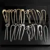 Pasador de aleación en forma de U transfronterizo con un diseño de moño de lujo ligero, accesorio para el cabello de alta gama para mujeres de estilo europeo y americano, pasador dorado y plateado