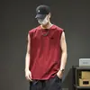 Chaleco sin mangas bordado transpirable de alta gama estilo americano para hombre, camiseta suelta informal deportiva de verano para fitness para hombre al por mayor