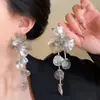 Brincos Europeus e Americanos de Luxo Leve com Franjas Florais Estilo Minimalista Simples Brincos de Tarraxa Moda Versátil Brincos de Alta Qualidade Atacado