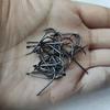 Anzuelo Qianyou de boca torcida a granel, anzuelo de pesca negro con púas, anzuelo explosivo, anzuelo de cuerda, anzuelo simple, suministros de equipo de pesca