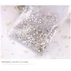 Venta Caliente Transfronteriza 1440 Piezas de Decoraciones para Uñas, Tamaños Mixtos en Bolsas, Vidrio de Cristal DIY Brillantes Coloridos de Fondo Plano