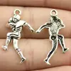 30x 15mm 1.6g accesorios para joyería de plata antigua material al por mayor colgante de jugador de rugby de música deportiva