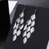 ¡Guau!Moda Transfronteriza Europea y Americana, Varios Pendientes Largos Metálicos de Borla Exagerada de Estilo Moderno con Elementos Elegantes