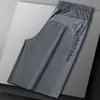 Pantalones cortos finos de verano de secado rápido para hombres y adolescentes, pantalones de seda de hielo, pantalones cortos casuales sueltos deportivos que combinan con todo, pantalones cortos de moda para hombres