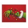 Manteles individuales de monstruo verde navideño transfronterizos, telas decorativas de ambiente navideño, tapetes termoaislantes, paños para servilletas de cocina y hogar al por mayor