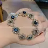Pulsera de Cristal de Zirconia Colorida Estilo Palacio Retro de Lujo Ligero Nueva Celebridad de Internet Temperamento Simple Pulsera de Gama Alta