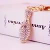 Llavero Creativo Estilo Bolos de Cristal Incrustado de Diamantes para Coche Accesorios de Bolso para Mujer Colgante Llavero Pequeño Regalo 1054