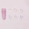 Decorações para nail art em formato de coração oco e estrela de cinco pontas, na cor macaron e transparentes como gelo, pequenos acessórios de resina para DIY de nail art e embelezamentos para unhas