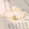 Pulsera Popular Nueva de Esmalte Azul Forma de Calabaza Estilo Chino de Xiaohongshu para Mujeres, Chapada en Oro de 18 Quilates e Incrustada con Diamantes Rojos, con Esmalte de Goteo para la Buena Fortuna y la Prosperidad