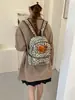 Nova mochila de pelúcia Hello Kitty com estampa de leopardo 2026, estilo coreano, fofa, de grande capacidade, bolsa escolar casual para meninas