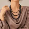 Collar de perlas de vidrio multicapa de moda japonesa y coreana, cadena de suéter larga para mujer, nuevos accesorios de moda a juego, colgante de ropa