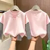 Camiseta de manga comprida para meninas, estilo primavera/outono, nova coleção 2026, peça básica da moda para crianças, algodão puro, blusa falsa de duas peças para meninas pequenas