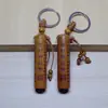Llavero de Madera de Durazno Pilar Cuadrado Sutra del Diamante Llavero Cilíndrico Sutra del Corazón Mantra Surangama Venta al por Mayor de Vendedores Ambulantes Calabaza
