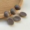 Acessórios de patch de resina cor creme japonês geométrico Oval meia pílula para brincos DIY feitos à mão material para cocar atacado