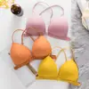 Ropa interior estilo japonés para mujer comercio exterior sujetador de copa triangular francés espalda bonita sujetador con botón delantero tirante cruzado tirante de espalda bonito transfronterizo