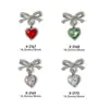 Nuevo Estilo de Lujo Ligero Celebridad de Internet Corazón Lazo Arte de Uñas Rhinestone Hueco Colgante Diseño Portátil Uñas DIY Accesorios Mayoreo