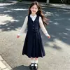 Conjunto de traje de estilo británico para niñas con chaleco y falda plisada, nuevo modelo primavera y otoño 2026, conjunto de tres piezas de estilo universitario para niños grandes
