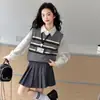 Conjunto Informal de Dos Piezas para Niñas: Chaleco de Punto Estilo Universitario y Falda Plisada Elegante para Primavera y Otoño 2026