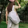 Bolsa de peito impermeável de nylon para mulheres, nova marca da moda, elegante e versátil, mochila simples e leve para viagens ao ar livre para homens