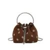 Bolsa de cubo con cordón de estilo fresco de verano transfronteriza para mujer, nueva versión coreana 2026 estilo Ins con lunares, bolsa de hombro cruzada