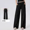 Calça esportiva casual solta para mulheres com bolsos laterais, cintura elástica com cordão, calça longa para fitness, calça larga de treino para Pilates com caimento