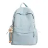 Mochila versátil de color sólido, fresca y simple, estilo japonés, para niñas, adecuada para uso casual, clases escolares y para estudiantes de secundaria y preparatoria.