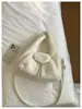 Bolso de mujer elegante de alta gama 2026 nuevo de moda versátil de felpa de mano de un solo hombro moda retro bolso cubo