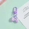 Llavero creativo de lazo a rayas de colores, accesorio colgante DIY, decoración fresca y elegante para bolsos de hombre y mujer