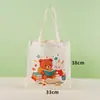 En stock bolsa de lona lisa impresión de logo personalizada gran capacidad bolsa de regalo bolsa de mano de lona bolsa de algodón ecológica