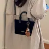 Bolsa de camurça nova versátil texturizada tipo balde casual 2026 para o dia a dia, transversal, bolsa de ombro retrô da moda para mulheres