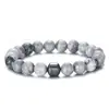 Europa y Estados Unidos transfronterizo más vendido piedra natural piedra volcánica piedra ojo de tigre pulsera de cuentas masculina imán pulsera magnética comercio exterior al por mayor