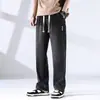 Jeans de mezclilla delgados lavados de pierna recta holgados para hombre, pantalones casuales de color liso de pierna ancha de marca moderna para verano-otoño