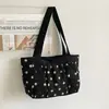Bolso de hombro rosa de lunares nuevo 2026, versátil, bolsa de lona de gran capacidad, moderno para ir al trabajo, morado
