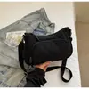 Bolsa Transversal Ombro Casual Moda Estilo Japonês Feminina 2026 Novo Modelo Casual Cor Sólida Leve para o Dia a Dia Bolsa Pequena de Lona
