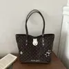 Bolsa de mano tipo tote grande con forma de estrella para mujer, estilo coreano, alto valor estético, versátil para ir al trabajo, bolso de mano casual elegante para mujer