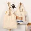 Bolsa chaleco de lona con logo estampado de puntos bolsa para dulces de boda chaleco liso bolsa de lona bolsa tote de Año Nuevo moda