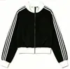 Chamarra casual de bloques de color a rayas estilo americano con cuello alto, nueva colección primavera/otoño 2026, corte holgado, casual y deportiva de moda