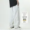 Pantalones casuales nuevos de primavera y verano para hombres y mujeres, pantalones de pierna ancha holgados de color liso con cremallera, diseño de malla a rayas, pantalones largos de estilo callejero