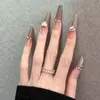 2025 Nuevo Otoño e Invierno Color Maillard Blanqueamiento Europeo y Americano Brillante Gama Alta Hecho a Mano Portátil Uñas Postizas Productos Terminados