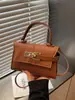 Bolso de Mano Nuevo Estilo Transfronterizo para Mujer, Bolso de Hombro Cruzado Retro de Cuero Suave para Viaje, Bolso Kelly de Lujo de Gama Alta al por Mayor
