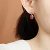 Aretes de Plata Esterlina S925 con Patrón de Hierba Rizada y Ágata Roja del Sur Yuebao Jewelry, Huevo de Bendición, Estilo Único de Otoño e Invierno