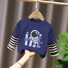 Camiseta de Manga Larga 100% Algodón para Niños Estilo Nuevo Primavera/Otoño 2026 Ropa Casual para Bebés y Niños Dibujos Animados Top Falso de Dos Piezas