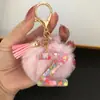 Suministra y Vende Llaveros con Alfabeto de 26 Letras en Forma de Corazón de Colores con Pompoms y Borlas, Colgantes para Llaves para Bolsos de Mujer