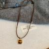 Collar de cuerda de cuero tejido con piedra de ojo de tigre para mujer, otoño e invierno 2024, nueva cadena de suéter popular, estilo retro, temperamento, accesorios que combinan con todo