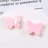 Acessório de borboleta com glitter doce e simples de 22mm para acessórios de cabelo DIY, presilhas de cabelo, capas de celular, decorações de sapatos e materiais decorativos