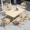 Departamento de ventas de muebles de ratán para exteriores patio exterior jardín mesa y silla pequeñas de ocio combinación de mesa de comedor para balcón exterior de villa