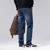 Moda popular para hombre / Nueva colección Primavera/Otoño 2026: pantalones de mezclilla elásticos para hombre, tiro medio a alto, ligeros, estilo casual de negocios, corte ajustado, versátiles