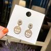 Novos brincos circulares de pérola estilo socialite Chanel elegante 2024 femininos Coreia do Sul Celebridade da Internet brincos duplos redondos longos elegantes