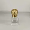 Venta al por mayor de fábrica, botella cuadrada de perfume transparente, sub-botella de cosméticos, tapa de bola, botella de vidrio vacía para muestras pequeñas, empaque